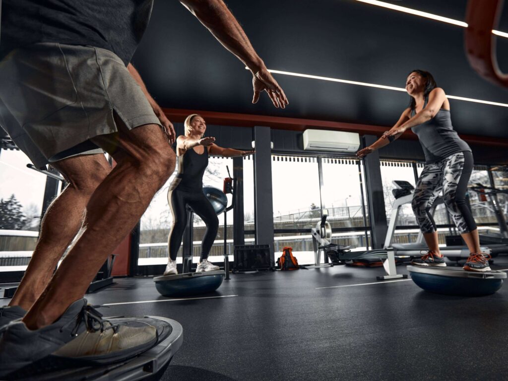 Trainer leading group balance session