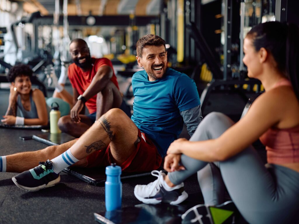 Group of athletes relaxing after a workout